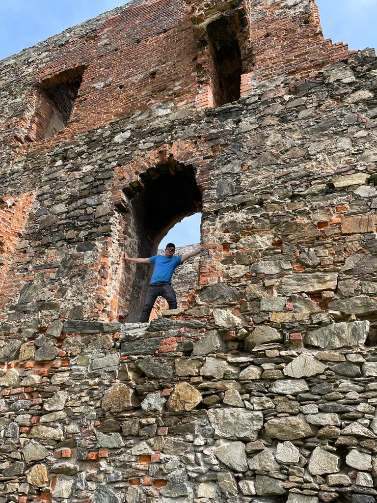 The author of the essay posing in the window of the ruined Frankenstein's castle. 
